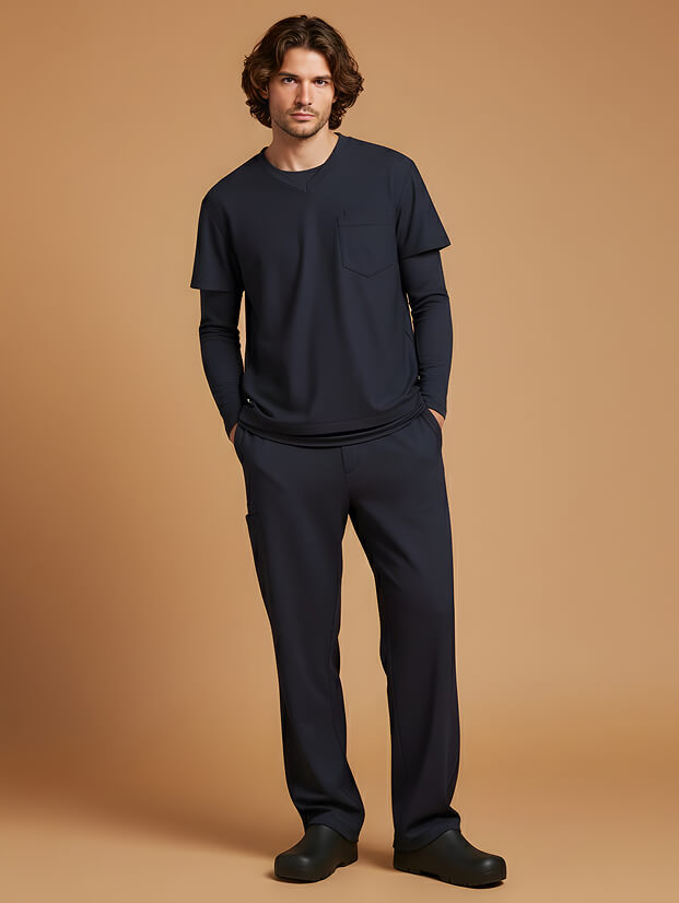 man wearing navy blue medical scrubs and black shoes